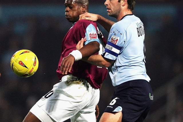 Paul Butler tackles  West Ham United's Marlon Harewood during the Championship clash at Upton Park in December 2004.