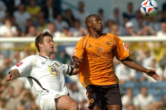 Paul Butler clears the ball from Wolves striker Carl Cort during the Championship clash at Elland Road in September 2006.