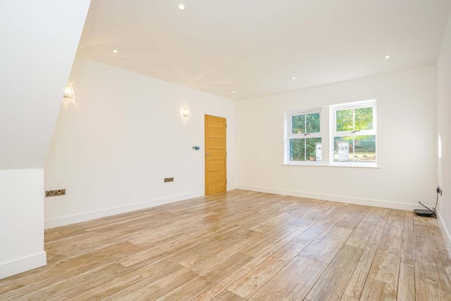 As well as the three reception rooms, there is also a spacious hallway and a downstairs shower room.