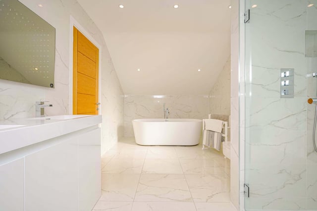 As well as the four en-suites, there is also a large porcelain tiled family bathroom.