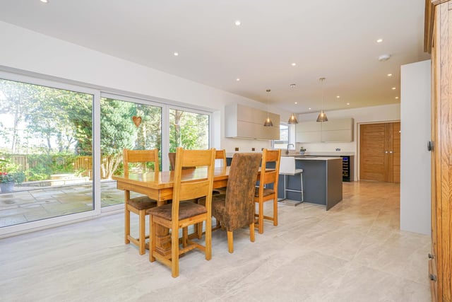 The dining area has bi-fold doors leading out into the garden.