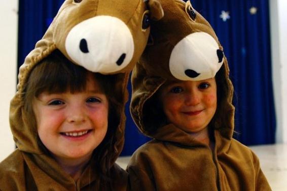 Two little donkeys prepare for their part in The Little Donkey Nativity Play at WGHS in 2004.