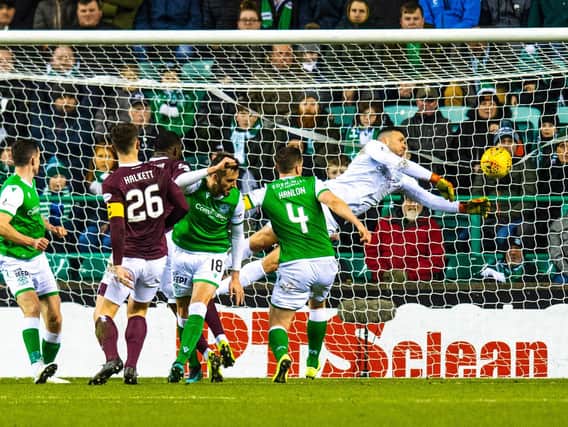 Hibs goalkeeper Ofir Marciano was unable to prevent Hearts winning Tuesdays derby.