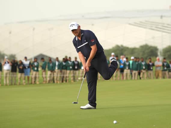 David Drysdale reacts to shaving the edge of the hole with a birdie putt at the 72nd hole to win the Commercial Bank Qatar Masters at Education City Golf Club in Doha. Picture: Getty Images