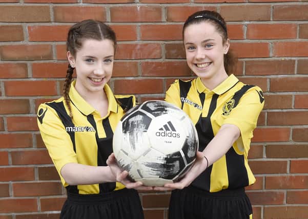 Lauren (left) and Sophie (right) Macdonald, both 13, travel 400 miles from Islay every week for their games with Hutchie Vale. (Picture: SWNS)
