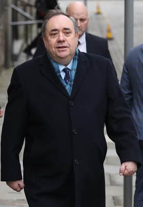 Alex Salmond leaves the High Court in Edinburgh after being cleared of all charges (Picture: Andrew Milligan/PA Wire)