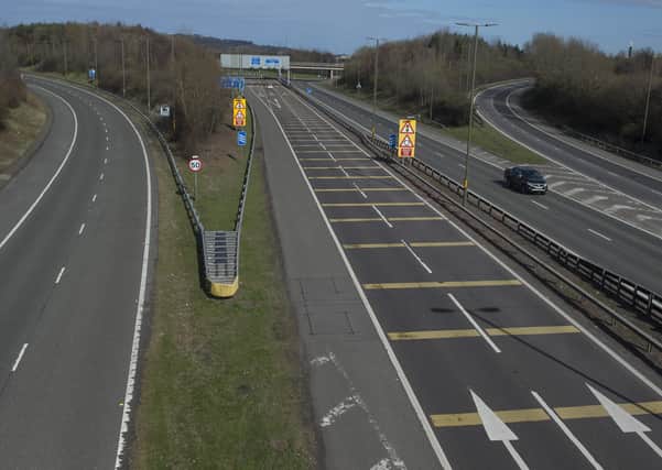 The M8 is virtually deserted as people stay at home (Picture: Neil Hanna)