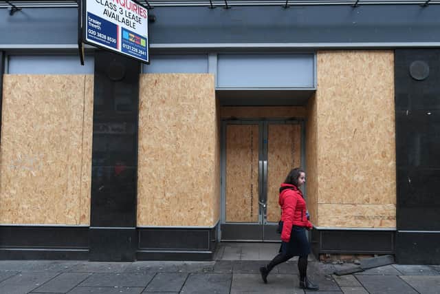 Many businesses across Scotland have been boarded up due to lockdown. Picture: John Devlin