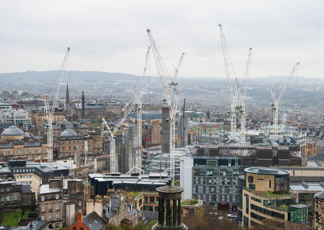 The sight of cranes, like these over the St James Centre site in Edinburgh last year, have long delighted local politicians (Picture: Ian Georgeson)