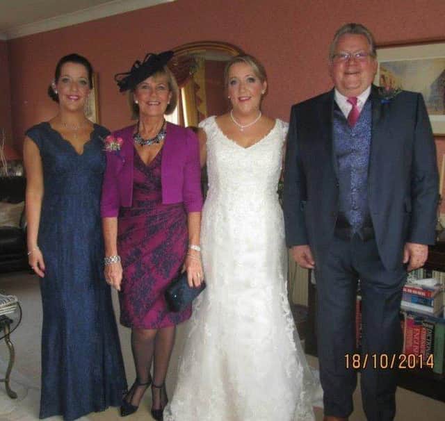 Mike Sanders, far right, pictured on daughter Katie Morton’s wedding day, with bride Katie, her twin sister Emma, far left, and wife Pat. Picture: contributed