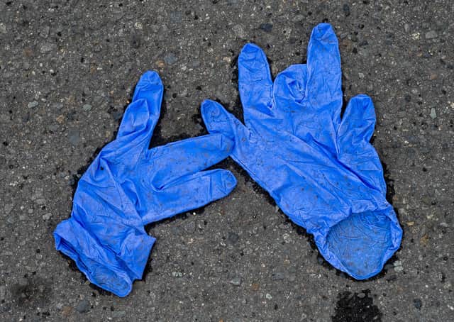 Please bin your latex gloves, don't drop them in the street (Picture: Getty)