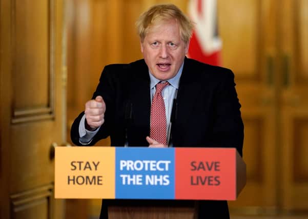 Boris Johnson fronts a press conference on Covid-19 before he himself was struck down by the virus (Picture: 10 Downing Street/AFP via Getty Images)