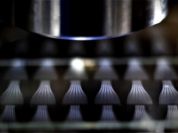 The firm develops and manufactures integrated glass-based photonics components. Picture: contributed.