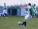 Derek Riordan hits his free-kick which cleared the wall and curled home past Robert Olejnik