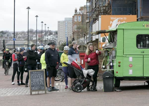 Portobello promenade, like Silverknowes, was packed with people last Saturday (Picture: Alistair Linford)