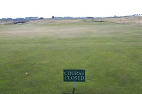 Course closed signs are now in place at venues all over Scotland, including Cranoustie Championship Course, where Francesco Molinari won a memorable Open Championship in 2018. Picture: Craig Boath