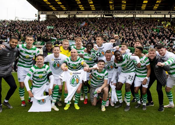 Celtic's players celebrate the Ladbrokes Premiership title in 2019. Picture: Craig Williamson/SNS