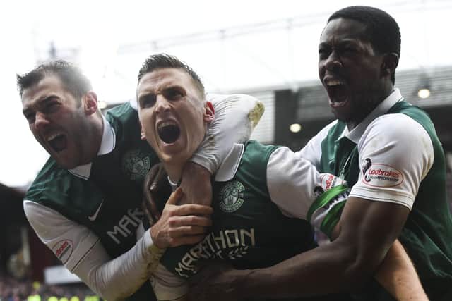 Kevin Thomson, captain Paul Hanlon and Marvin Bartley celebrate as Hibs keep their 2016 Scottish Cup dream alive at Tynecastle. Picture: Craig Williamson/SNS