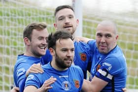 Bo'ness United players can celebrate being named Premier Division champions following the East of Scotland League vote to finish the campaign.