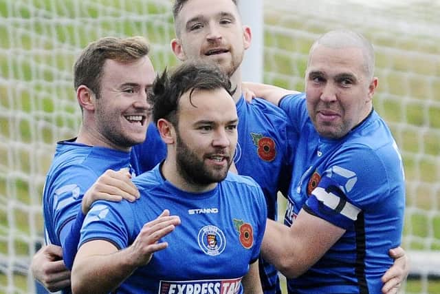 Bo'ness United players can celebrate being named Premier Division champions following the East of Scotland League vote to finish the campaign.