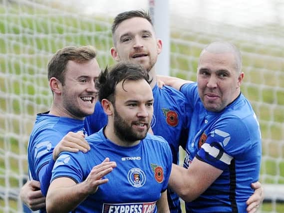 Bo'ness United players can celebrate being named Premier Division champions following the East of Scotland League vote to finish the campaign.