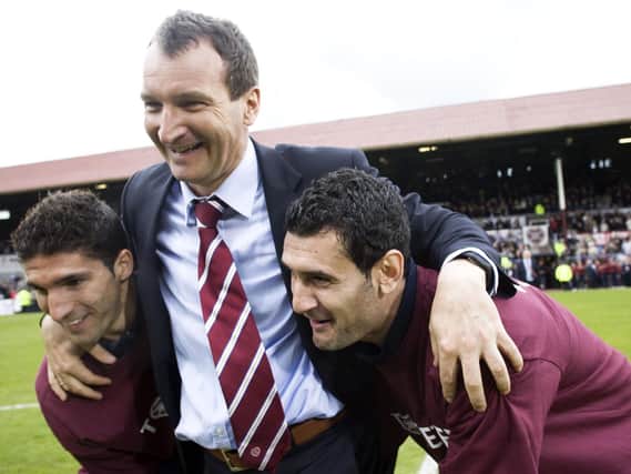 Csaba Laszlo (centre) celebrates with Bruno Aguiar (left) and Christos Karipidis