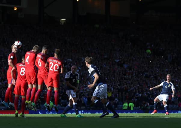 Leigh Griffiths puts Scotland 2-1 up against England in a World Cup qualifier at Hampden in 2017