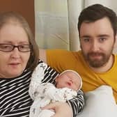 Margaret Laidlaw died after contracting Covid-19. She is pictured with her son Iain and grandson Lewis (Iain’s son).