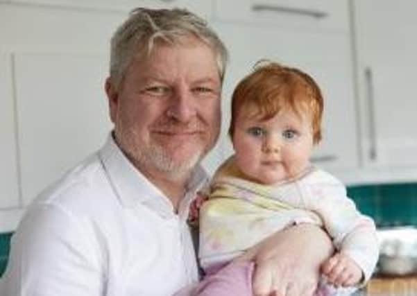 Angus Robertson and baby Saoirse