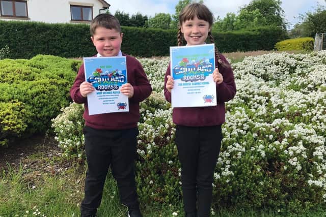Rory and Bryony Swan with their certificates.