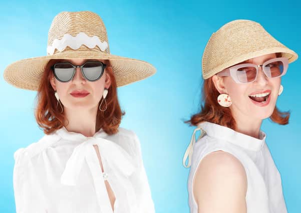 Edinburgh-based milliner  Sally-Ann Provan models a fedora and a visor from her new collection of summer straw hats