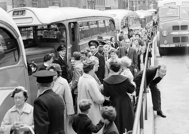 Holidaymakers queue at Edinburgh Bus Station at the start of Trades Fortnight in 1959