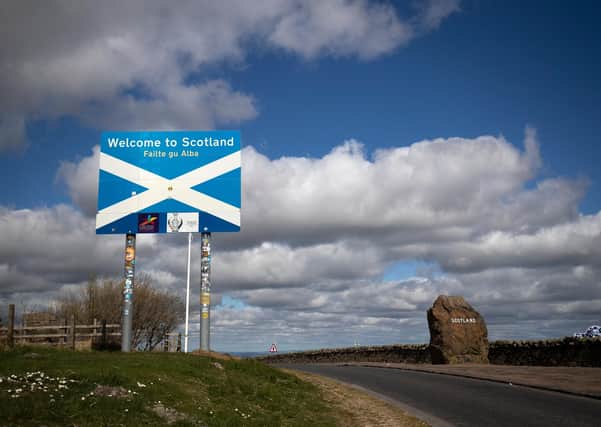 Motorists driving north across the Scotland-England Border were met by protesters who swore at them (Picture: Jane Barlow/PA)