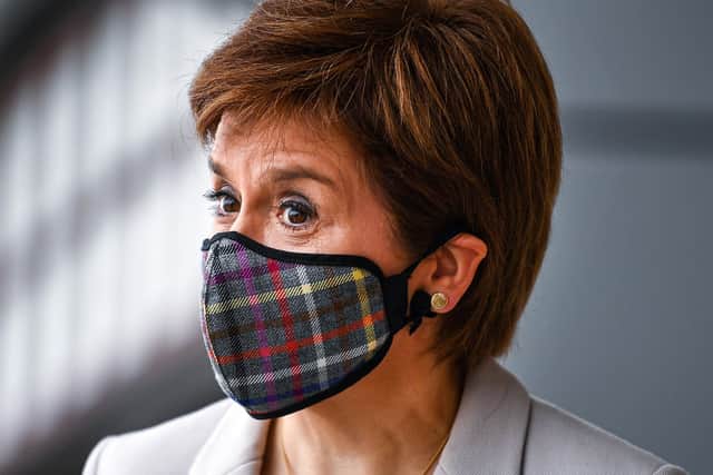 If Nicola Sturgeon can wear a face mask then you can too (Picture: Jeff J Mitchell /PA Wire)