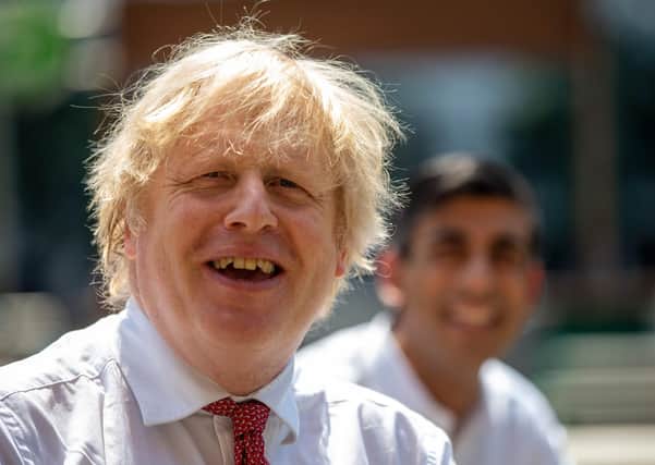 Boris Johnson, with Chancellor Rishi Sunak, has committed significant funds to help creative industries through the Covid crisis (Picture: Heathcliff O'Malley/pool/AFP via Getty Images)