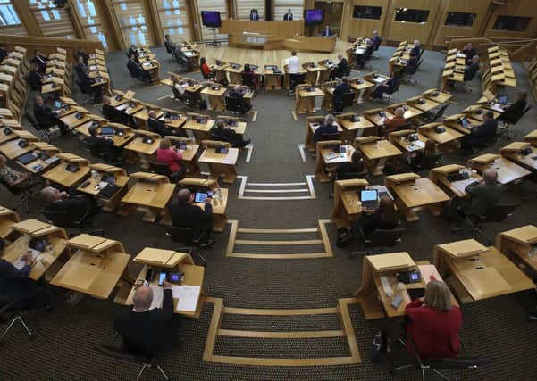 The Scottish Parliament sits in social-distancing mode (Picture: Fraser Bremner)