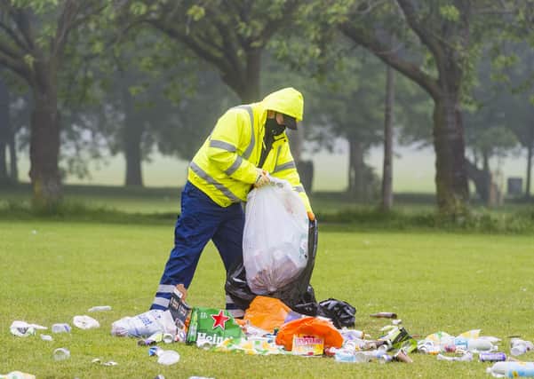 Council staff clear rubbish left in Edinburgh's Meadows