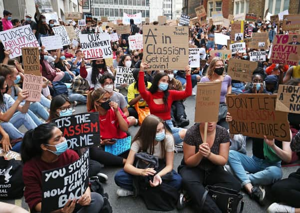 Pupils protest outside the Department for Education in London in response to the downgrading of A-level results before the UK Government's U-turn on the decision (Picture: Jonathan Brady/PA Wire)