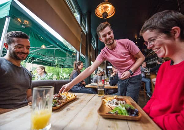 Throughout August, the British government will subsidise a 50 per cent discount of up to £10 a head on meals and non-alcoholic drinks at participating establishments on Mondays, Tuesdays and Wednesdays in a bid to encourage the public to eat out after months in lockdown. (Picture: John Devlin)