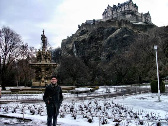 Oscar De Muriel and a snowy Edinburgh Castle