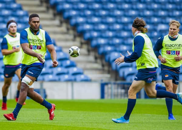 Bill Mata passes to Hamish Watson during an Edinburgh training session ahead of the Pro14 semi-final. Picture: Mark Scates/SNS