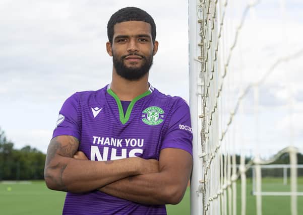 New signing Dillon Barnes is unveiled at the Hibernian Training Centre. Picture: SNS