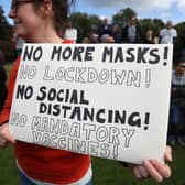 Campaigners gathered at Holyrood to protest against the imposition of lockdown restrictions (Picture: Andrew Milligan/PA Wire)