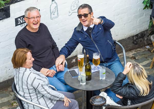 Drinkers can sit inside pubs from today (Picture: SNS)