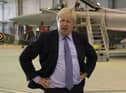 Boris Johnson in an aircraft hanger at RAF Lossiemouth (Picture: Andrew Milligan/PA Wire)