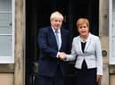 Nicola Sturgeon and Boris Johnson need to work together to fix Covid testing system (Picture: Jeff J Mitchell/Getty Images)