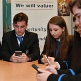 Pupils check their email for their exam results from the SQA – many were set to be disappointed (Picture: John Devlin)