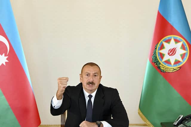 Azerbaijani President Ilham Aliyev gestures as he addresses the nation following fighting between Armenia and Azerbaijan (Picture: Azerbaijani Presidential Press Office via AP)