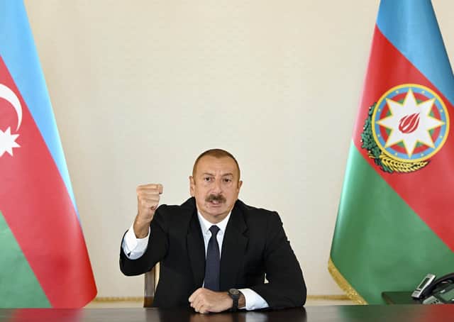 Azerbaijani President Ilham Aliyev gestures as he addresses the nation following fighting between Armenia and Azerbaijan (Picture: Azerbaijani Presidential Press Office via AP)