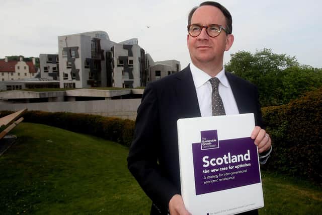 Sustainable Growth Commission chair Andrew Wilson outside the Scottish Parliament with its report. (Picture: Gordon Terris/The Herald/PA Wire